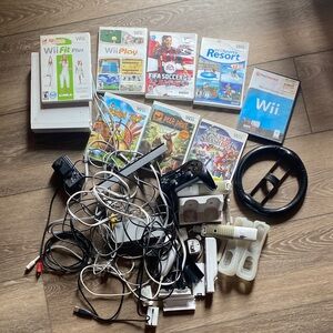 Nintendo Wii Bundle with Black and White Controllers